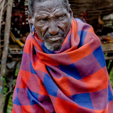 Elderly Maasai Warrier in village.