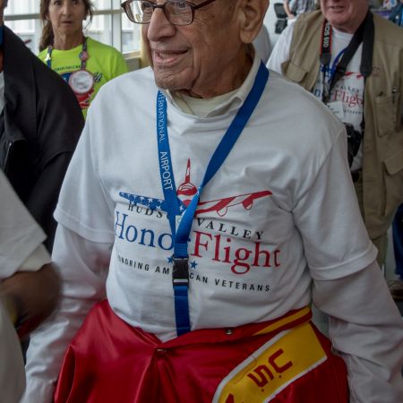 Honor Flight World War II Marine veteran arriving at Reagan National Airport, Washington, D.C.